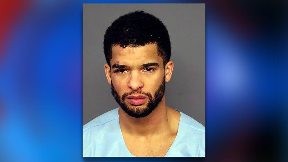This undated booking photo provided by the Denver Police Department shows Coban Porter. Police...