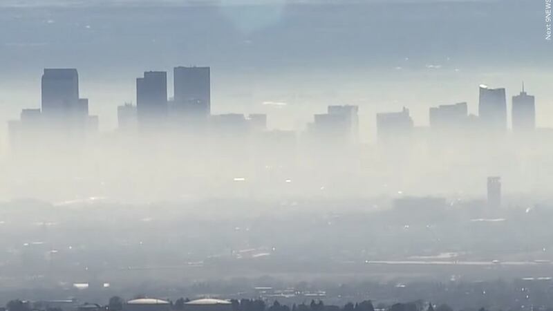 FILE - Smog blankets Denver in this photo dated June 19, 2021.