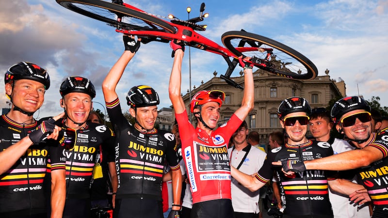 Sepp Kuss of Jumbo-Visma celebrates after winning the 21st stage of the Vuelta cycling race...